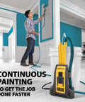 Man using Smart Sidekick Workhorse Power Paint Roller Direct Feed System pulls paint from bucket for large room project