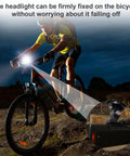 Cyclist uses Bike Light Mount And Flashlight Holder For Handlebar Quick Release Universal Adapter For Trek Bontrager at night.