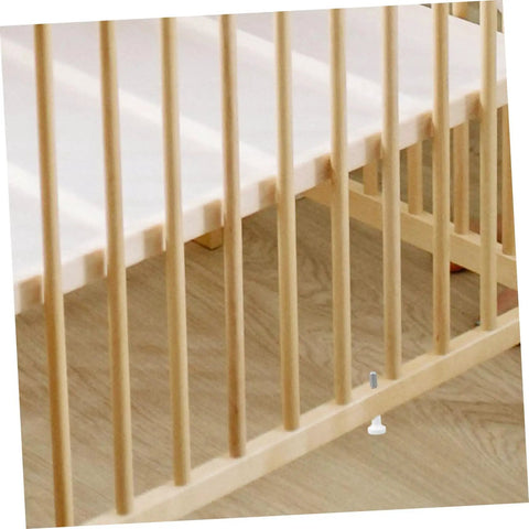 Wooden crib with visible spring-loaded latch, part of Four Pack Crib Latch Window Screen Pin Set Spring Loaded Bed Latches Window Screen Repair Kit For Cotter Draw No Fuss Quick Install Easy To Use Durable Window And Bed Latch Kit For Small Cribs