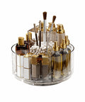 360 Degree Rotating Makeup Organizer With Lazy Susan Turntable, clear acrylic tray holding cosmetics, brushes, and perfume.