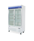 Heavy Duty Commercial Upright Merchandiser Freezer With Digital Temp Readout Eight Coated Wire Shelves Frost Free Auto Cycle Built Tough For Retail Or Restaurant Use In Classic White Finish, showcasing glass doors and shelves.
