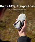 Ultra Lightweight Drone Under 249g With 4K Video And 8K Photos 3 Axis Gimbal held in hand showcasing compact size