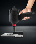 Hand using 8mm Pneumatic Hole Puncher for Metal Sheets Heavy Duty Air Hole Punch Tool with 360 Degree Rotating Design, punching metal plate.