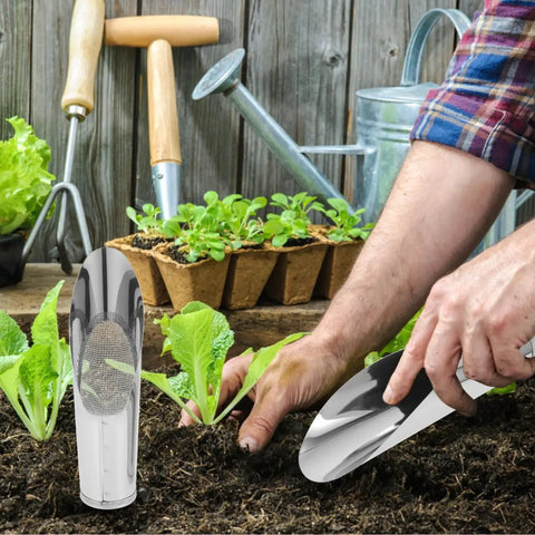 Two Piece Stainless Steel Garden Shovel And Soil Sifter Set in use for planting vegetables in a garden.