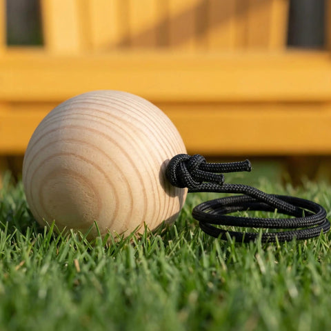 27 Foot Cornhole Distance Tool And Measuring Device For Quick Accurate Board Setup Easy Cornhole Game Accessory To Nail Regulation Gap Between Boards Save Time And Keep Your Games Tight. wooden ball with black cord on grass