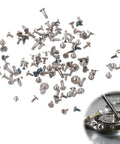 100Pcs Watch Battery Clamp Screws Set For Micro Screw Replacement In Watches, Essential Watch Repair Kit scattered and in use.