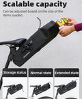 Expandable Waterproof Bikepacking Saddle Bag with 3L capacity shown adjustable, fitted under a bicycle seat for storing gear.