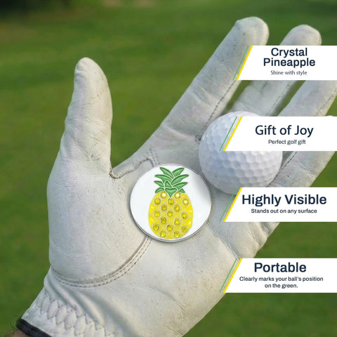 Golfer's hand holding Pineapple Shaped Golf Ball Marker For Alignment And Game Changer Putting Green Precision Metal Ball Marker 1 Inch Wide