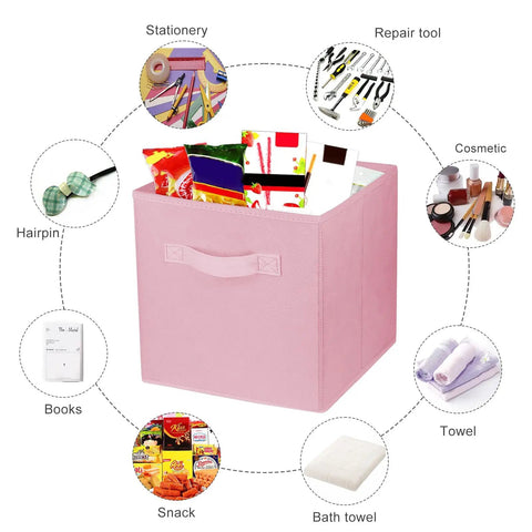 Super Durable Collapsible Storage Cubes 10 5 Inch Foldable Fabric Bins showcasing stationery and snacks inside a pink bin.