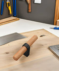 Solid Wood Drawer Pulls And Cabinet Handles Black Single Hole Wood Doorknob European Style on a workshop desk
