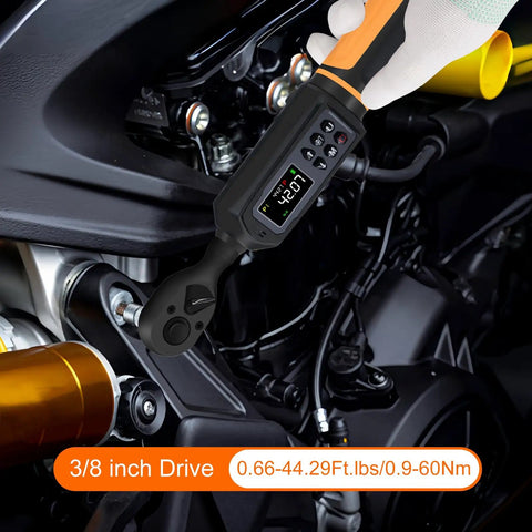 Digital Torque Wrench With 3 Eighths Inch Drive And Dual Direction Ratchet showing LED screen reading 42.07 on engine