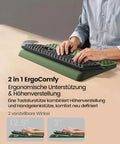 Person using All In One Ergonomic Keyboard Stand With Built In Wrist Rest And Memory Foam Pad No Slip Desk Cushion in green at desk