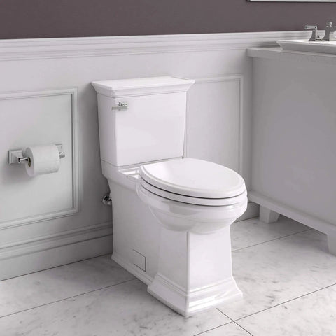 Heavy Duty Two Piece Elongated Toilet Featuring Reliable Powerwash Rim And Comfort Height Design For No Fuss Daily Refresh In Pristine White Porcelain in modern bathroom setting.