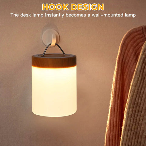Wall-mounted Go-To Night Light Touch Lamp with Built In Battery RGB LED Desk And Bedside Lamp illustrating hook design.