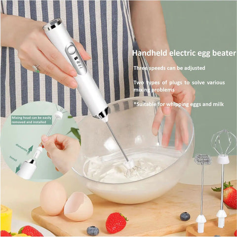Rechargeable Milk Frother With Three Speed Electric Handheld Coffee Mixer in use with bowl of cream, includes whisks and accessories