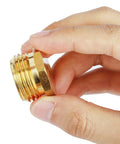 Brass Garden Hose Pipe Plug End Cap Three Quarter Inch GHT Male Threaded Fitting held in hand for Irrigation Systems and Water Tubing Stopper
