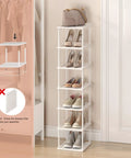 Space Saving Bamboo 7 Tier Shoe Rack Organizer Free Standing Narrow Corner Shelf For Boots And Sneakers For Entryway Closet Garage Mudroom Living Room White installed in entryway corner with shoes.