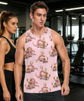 Mens Pink Sleeveless Tank Top With Concealed Pocket And Bold Mechanical Lizard Clock Graphics And Moisture Wicking Mesh Athletic Tee Built Different For Big Workouts And Lowkey Weekend Hangouts worn by male model in gym setting.