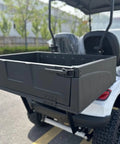 Rear view of Two Seater Electric Golf Cart With 48V Lithium Battery And Heavy Duty Plastic Bed showing cargo bed in black.