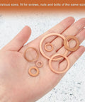 Top Notch Solid Copper M27 Flat Washers 4 Pack displayed in hand, various sizes for screws, bolts, and nuts.