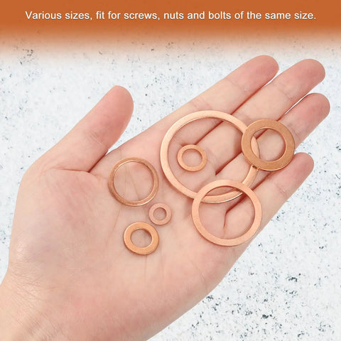 Top Notch Solid Copper M27 Flat Washers 4 Pack displayed in hand, various sizes for screws, bolts, and nuts.