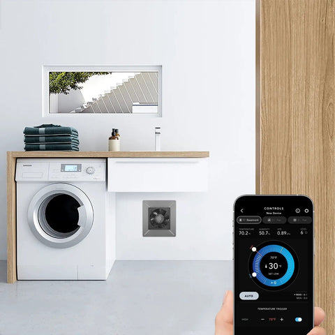 Smartphone displaying app controlling AirTitan T3 6 Inch Exhaust Vent Fan With WiFi Temperature Humidity Controller in laundry room