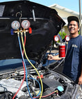 3 Piece AC Manifold Gauge Hose Kit For R134A R404A R12 R502 with one quarter inch threads installed on car engine