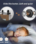 Close-up of barn door soft-close hardware and a sleeping child indicating noise-free functionality.