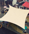 Beige 7 By 12 Ft Waterproof Sun Shade Sail UPF50 Plus Canopy Awning Shelter covering people with umbrellas