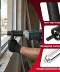 Close-up of a power drill using the Beefy Cordless Drill Rivet Attachment Kit with 4 heads for riveting a window frame.