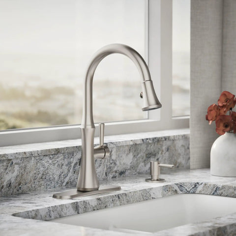 Kaori Single Handle Kitchen Faucet With Pull Down Sprayer And Soap Dispenser In Vibrant Stainless Finish on marble countertop