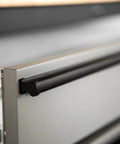 Close-up of the handle on a Heavy Duty Steel Rolling Tool Chest With Fourteen Deep Full Extension Drawers And Massive Mega Top Tray.