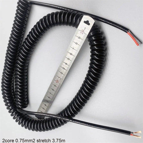 Heavy-Duty Coiled Power Cord 2 Core Spiral Extension Cable 1.5Mm Square Conductors Flexible Stretch Design lying next to a ruler.