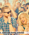 Two people wearing Blackout Soft Foam Earplugs With 32 dB NRR, enjoying a lively concert setting with a crowd.