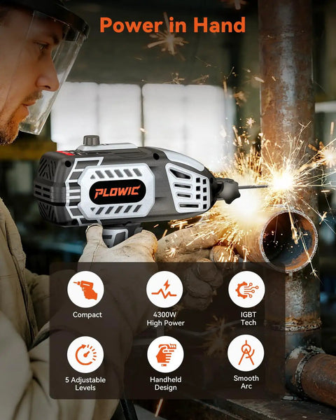 Man using a portable 110V arc welder with IGBT inverter on a metal pipe, sparks flying, showing handheld design and adjustable output.