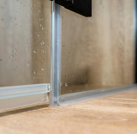 Frameless Shower Door Bottom Seal for 3/8 Inch Glass, 36 Inch Length, Clear Vinyl Slip On Fit installed on glass door