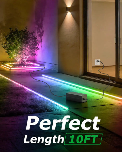 12V 6A Power Supply Adapter 72W with a 10ft cord powering outdoor LED strip lights on a patio, connected to a wall outlet.
