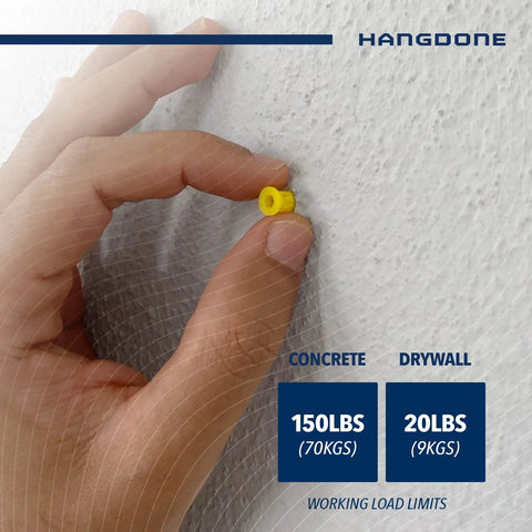 Hand holding yellow ribbed wall anchor pushed into drywall showing Ribbed Wall Anchor Kit For Drywall And Concrete 100 Pack Yellow Nylon Anchors With Screws Included Seven Eighths Inch Length For Mounting Shelves Mirrors Cabinets And Lamps Pan Head Phillips Screws