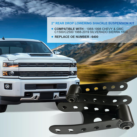 Beefy 2 To 3 Inches Rear Suspension Drop Shackle Kit For Leaf Springs, shown in front of Chevy Silverado truck