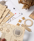 Epic 3D Wooden Airship Puzzle Kit For Adults with wooden sheets and assembly guide, showcasing intricate DIY miniature ship parts.