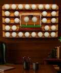 2 In 1 Golf Ball Display Case With Clear Acrylic Cube Stand, wood base, turf mat, tee holder, mounted on wooden wall panel.