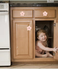 4 Piece Pink Petal Drawer Knobs With Bling Centers Spark A Major Bedroom Glow Up Solid Zinc Alloy Cabinet Hardware For Dresser And Closet Upgrade Top Notch Girls Room Decor on kitchen cabinets with a smiling child.