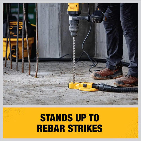 Worker drilling concrete with Beefed-Up SDS Max Rotary Hammer Bit With 4 Cutter, 2 Inch By 22-1/2 Inch Iron Blast Technology