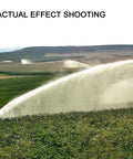 Impact Sprinkler With Pressure Gauge, 360 Degree Slow Rotation, spraying water over farmland, wide coverage visible