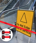 Heavy Duty Retractable Belt Barrier Wall Mounted Crowd Control Divider Featuring Smooth Gliding Telescoping Tape used to block escalator access.