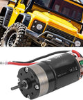 Beefy Metal Gearbox Upgrade With 540 Brushed 55T Motor in front of RC Crawler, compatible with SCX10 and HSP 1/10 cars