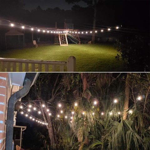 Outdoor Globe String Lights Hanging Kit With 164ft Black Vinyl Coated 304 Stainless Steel Cable illuminating a backyard at night.
