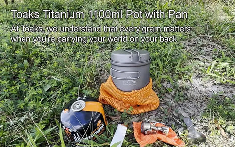Titanium 1100ml Pot And Pan Set For Backpacking Ultralight Outdoor Cooking Gear with mesh bag next to camp stove on grass