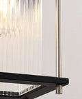 Close-up of Dope Weatherproof Outdoor Wall Light With Striped Glass, Black And Nickel Finish, 13 Inch Exterior Fixture corner