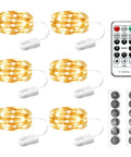 Six Pack Battery Operated Fairy Lights With Remote And Timer, 7 ft long 20 LED firefly string lights with batteries and remote.